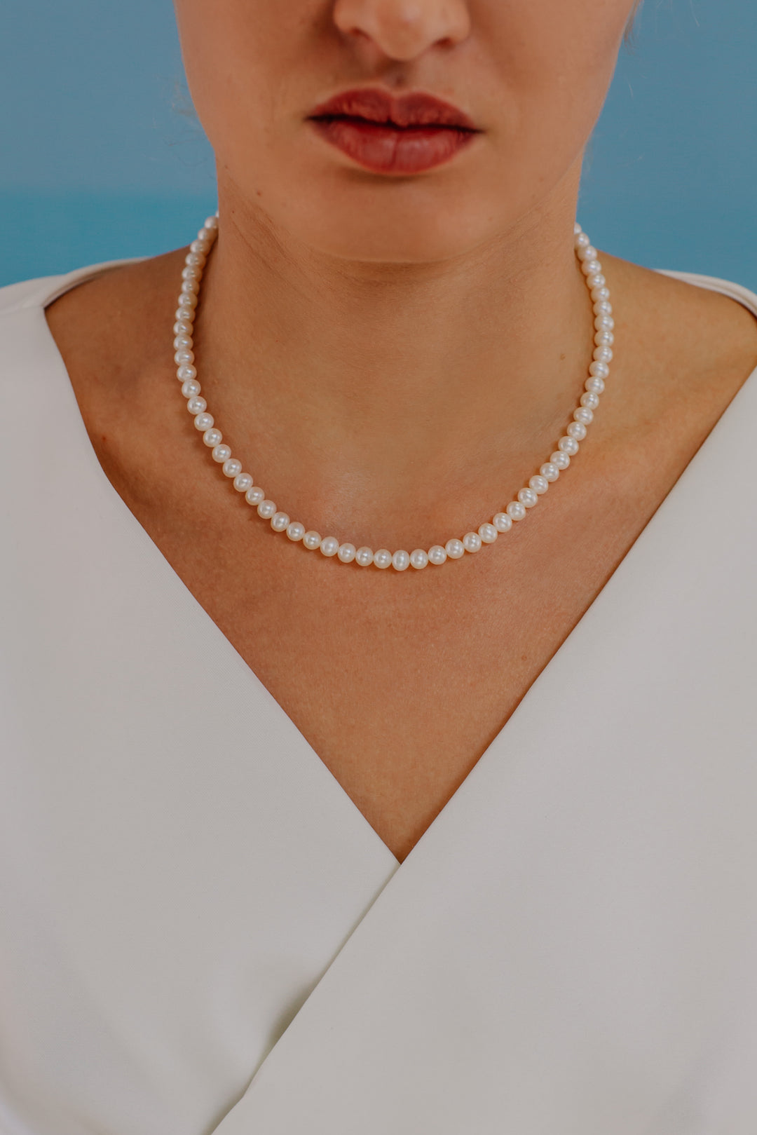 Comete Strand of Freshwater Pearls in Silver and Star in Yellow Gold 50 cm FWQ31050