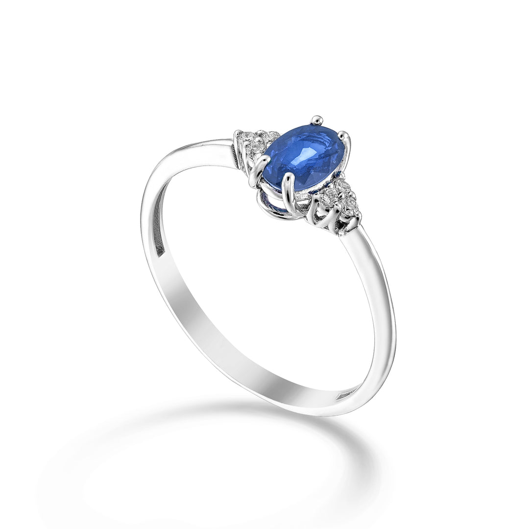 Nihama an 18k oval sapphire 6x4 and side diamonds NA5211O4ZFD