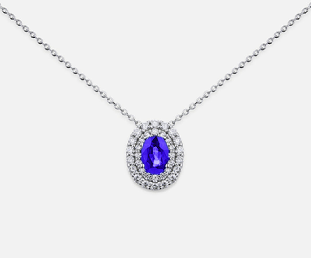 Nihama cl 18k tanzanite n. oval 6x4 ct.0.38 dia ct.0.33 ND5061O4TZN