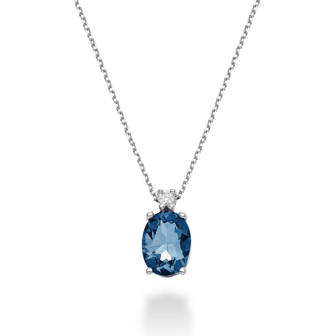 Nihama cl 18k oval London blue topaz 8x6 ct.1,40 diam. ct.0,025 ND5036O4TPBL