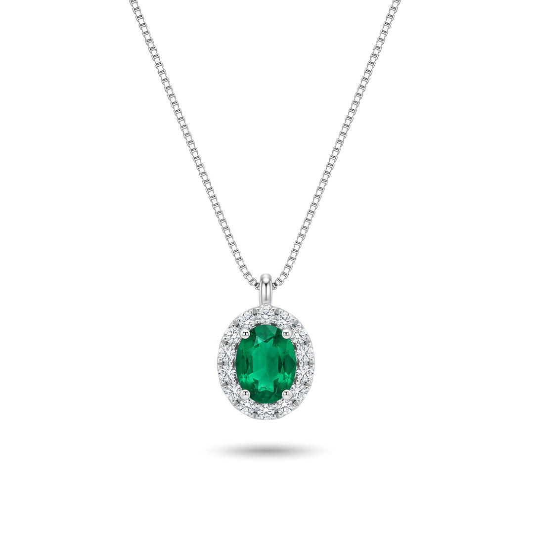Mikiko cl 18k oval emerald 5x4 with diamond surround MD5202O4BE