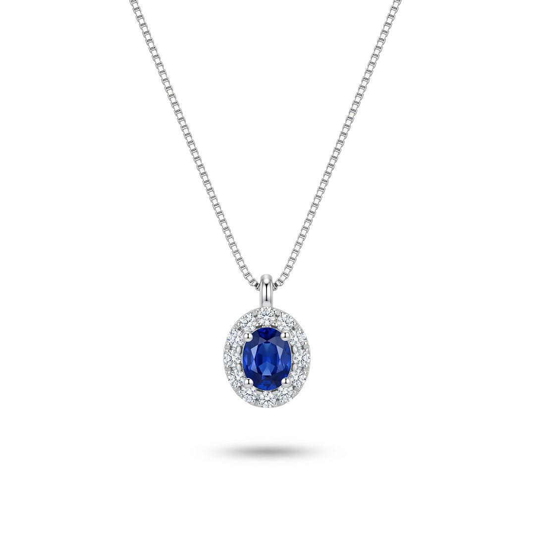 Nihama cl 18k oval sapphire 4x3 with diamond surround ND5201O4ZFN