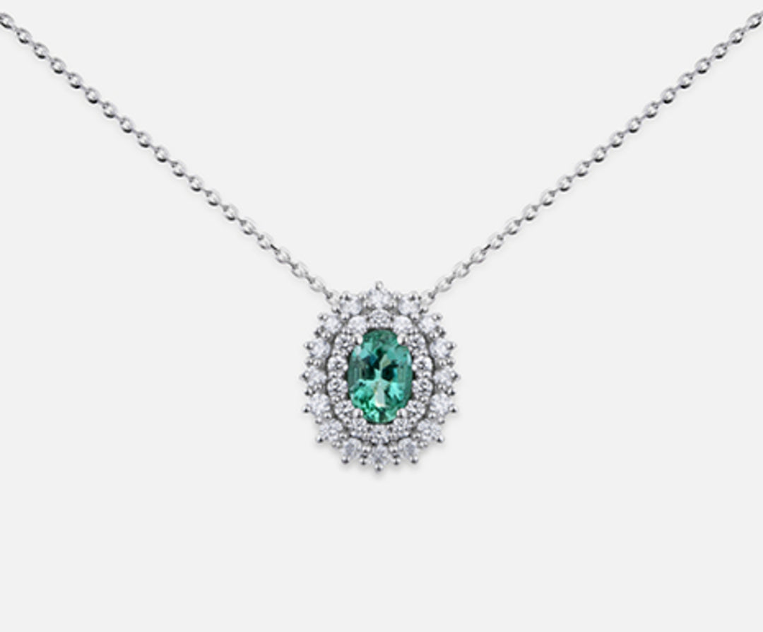 Nihama cl 18k emerald n. oval 6x4 ct.0.35 dia ct.0.37 ND5060O4SMN035