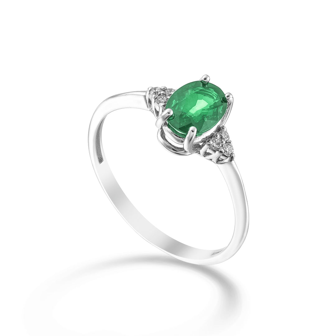 Nihama an 18k oval emerald 7x5 and side diamonds NA5210O4BE