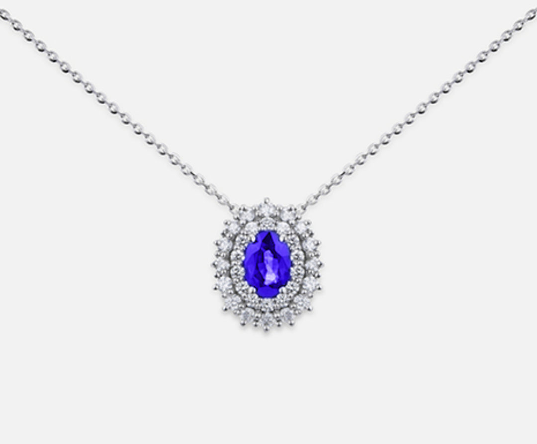 Nihama cl 18k tanzanite n. oval 6x4 ct.0.38 dia ct.0.37 ND5060O4TZN