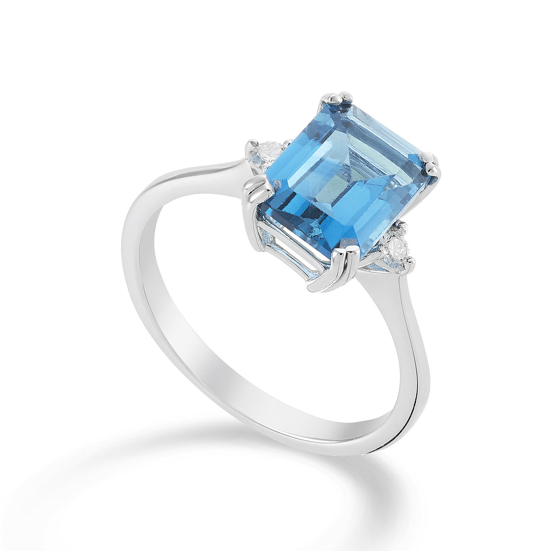 Nihama an 18k octagonal blue topaz 7x9 ct.2.90 diam. ct.0,08 NACL090DITPAZ4O4