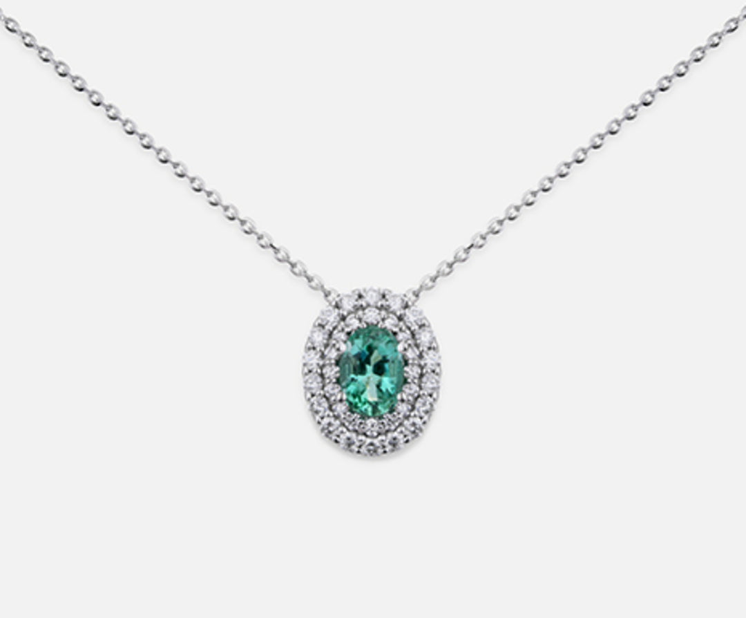 Nihama cl 18k emerald n. oval 6x4 ct.0.38 dia ct.0.33 ND5061O4SMN038