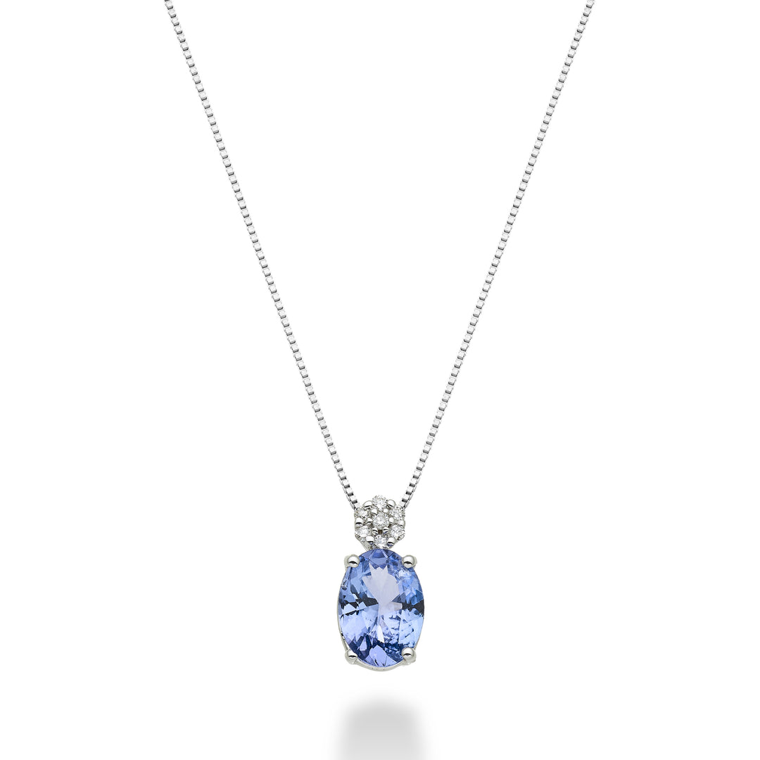 Nihama cl 18k tanzanite n. oval 7x5 ct.0.60 diam. 0.05 ct ND5025O4TZN