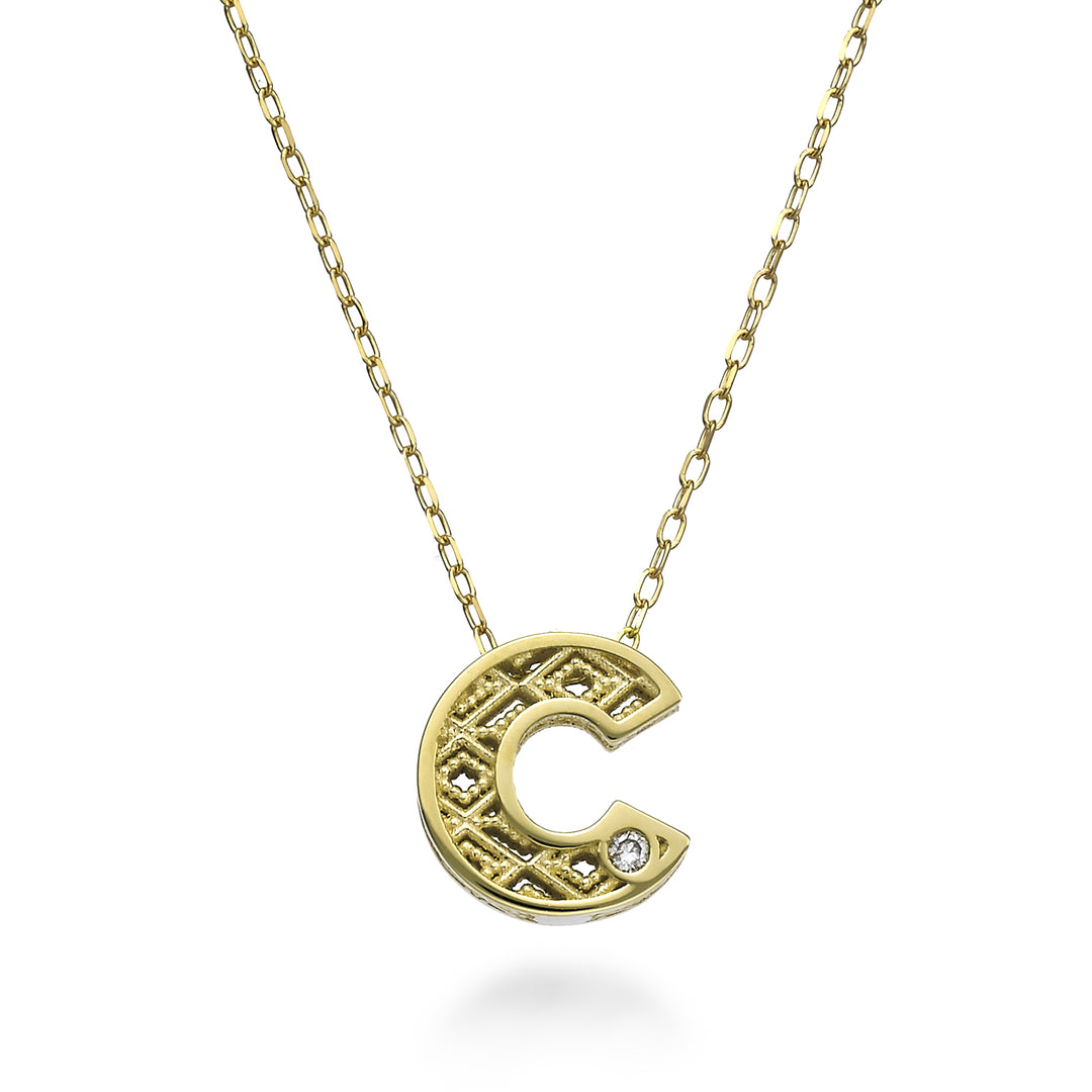 Nihama cl 18k letter c yellow gold diam. ct.0.01 NDLETCO1