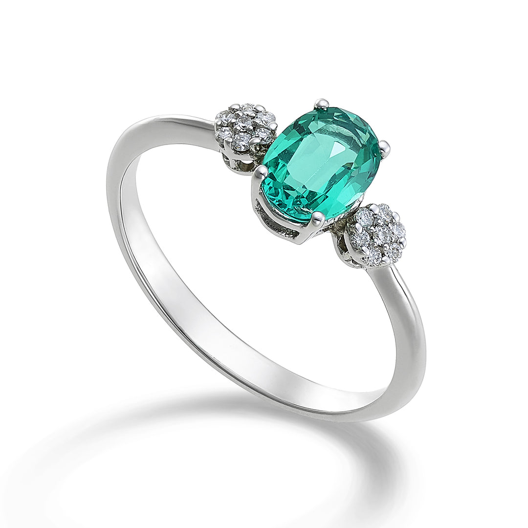 Nihama an 18k oval emerald 7x5 ct.0,60 diam. 0.08 ct NA5058O4BE