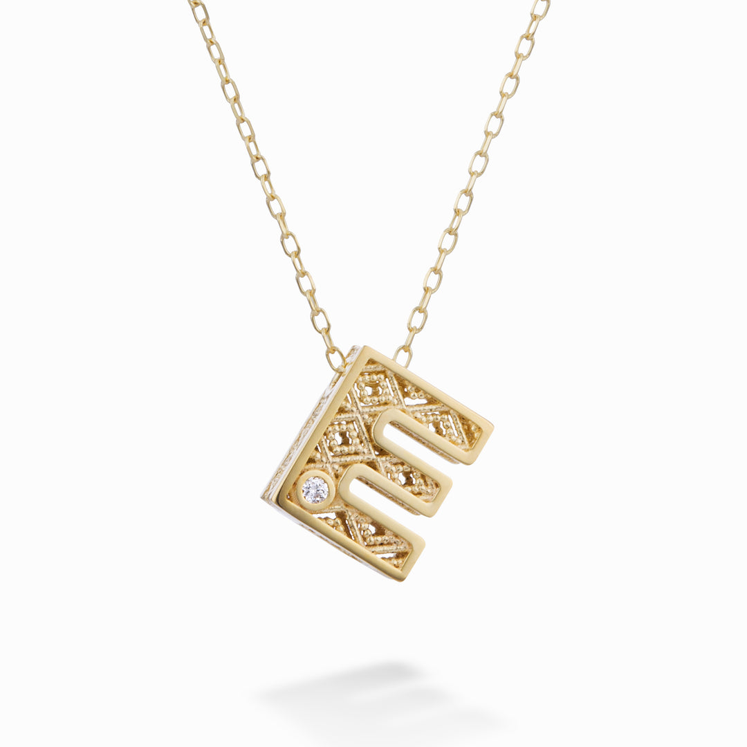 Nihama cl 18k letter e yellow gold diam. ct.0,01 NDLETEO1