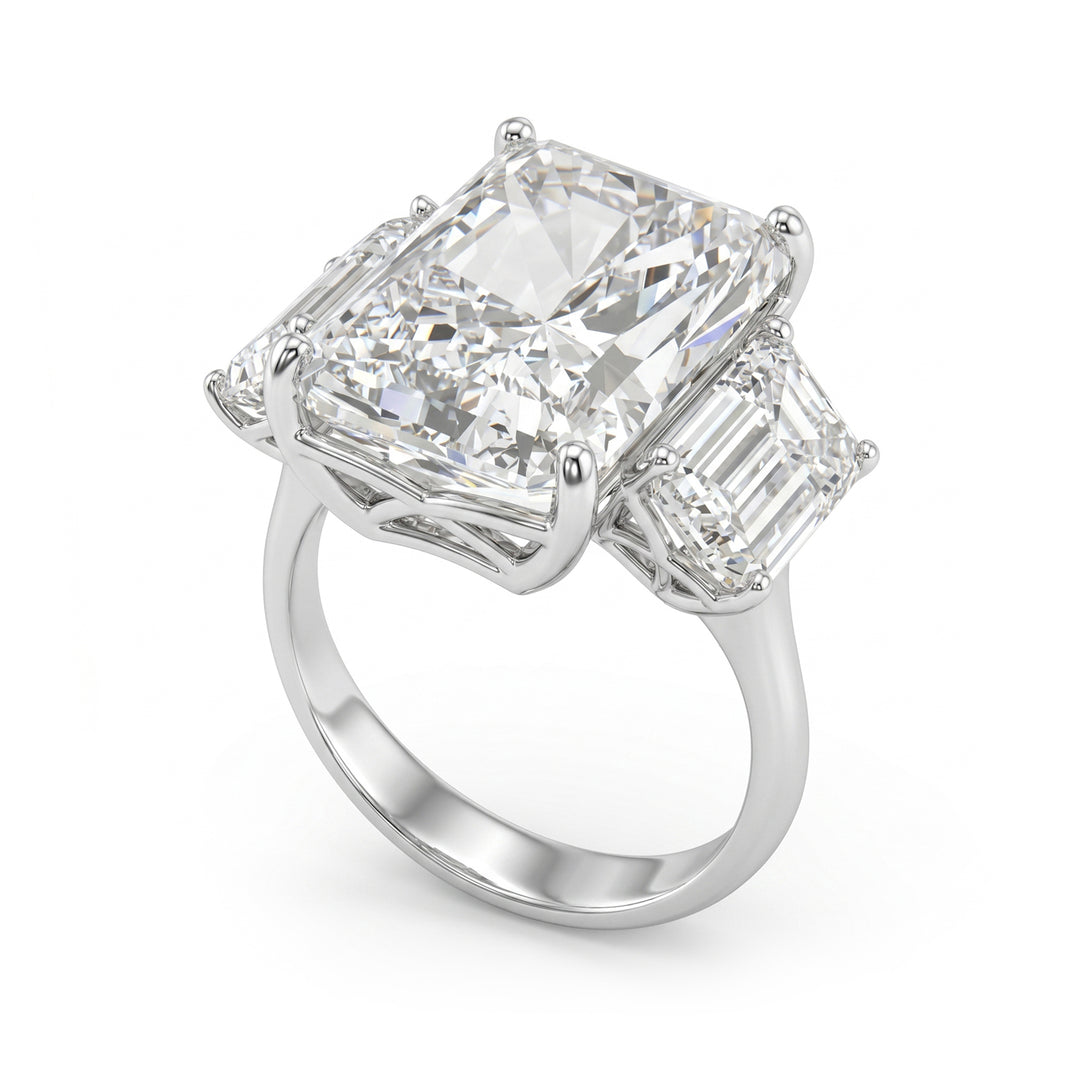 X-Diamond an 18kt lab g.d.tot. 13.97 ct, radiant cen 10.51 ct, and lateral emeralds 3.46 ct XXDAPU135O4RCBI1397