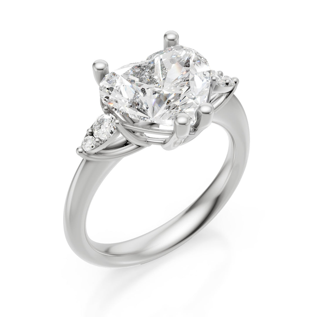 X-Diamond an 18kt lab g.d. total ct. 3.16- cent. ct. 3.02 heart - round lat ct. 0.14 LXDAPU074O4CUBI316
