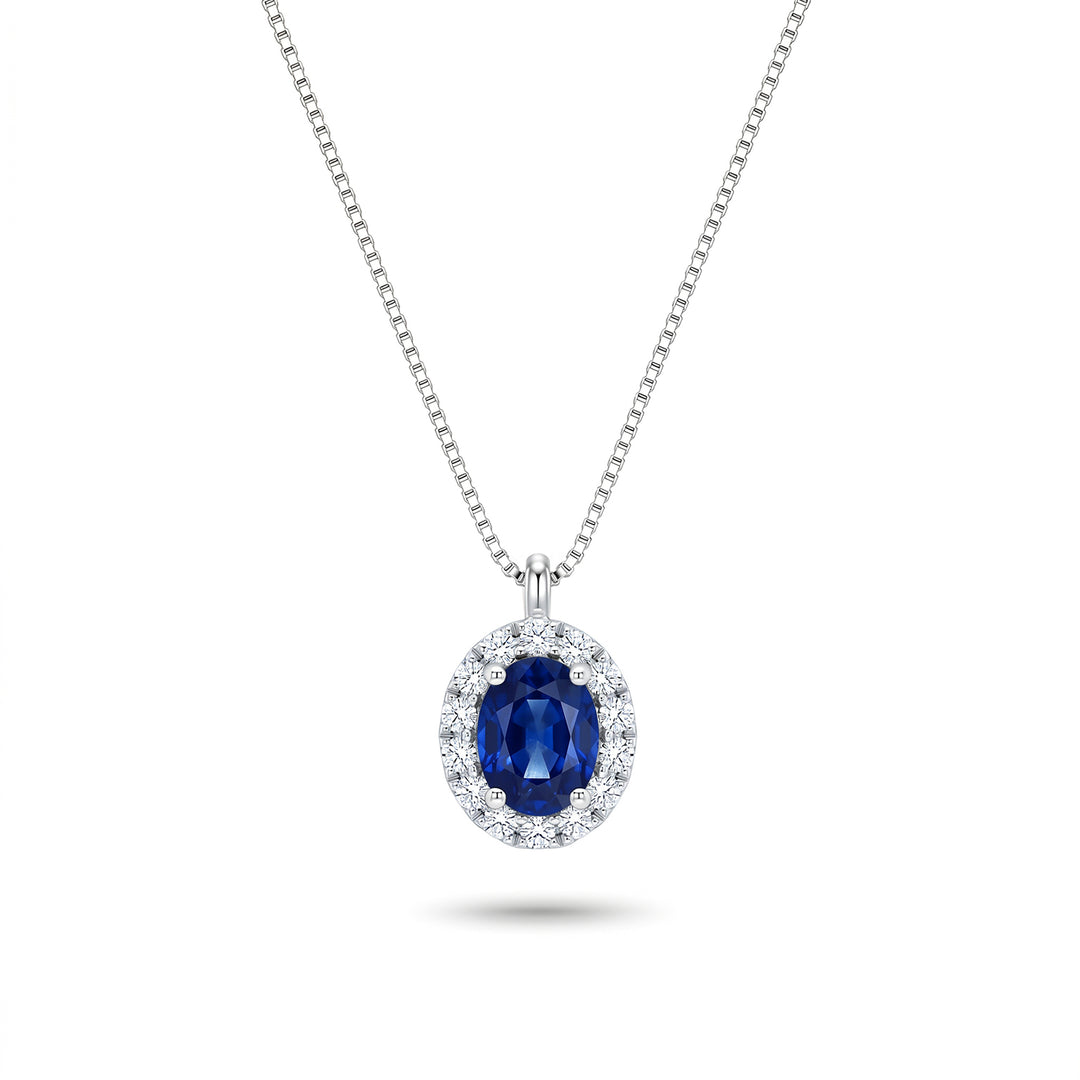 Nihama cl 18k oval sapphire 5x4 with diamond surround ND5202O4ZFN