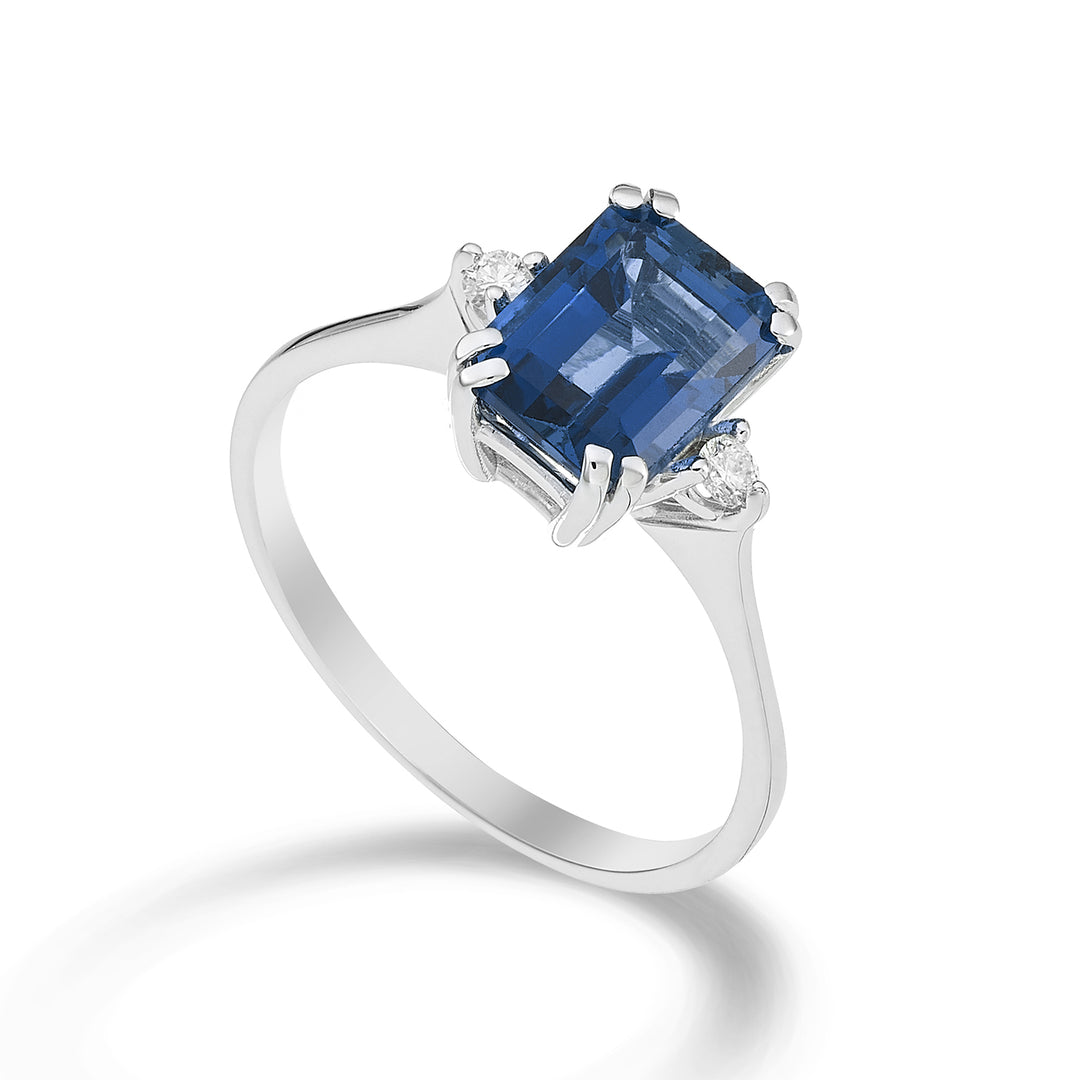 Nihama an 18k octagonal London blue topaz 8x6 ct.2.65 diam. ct.0,06 NACL090DITPBL3O4
