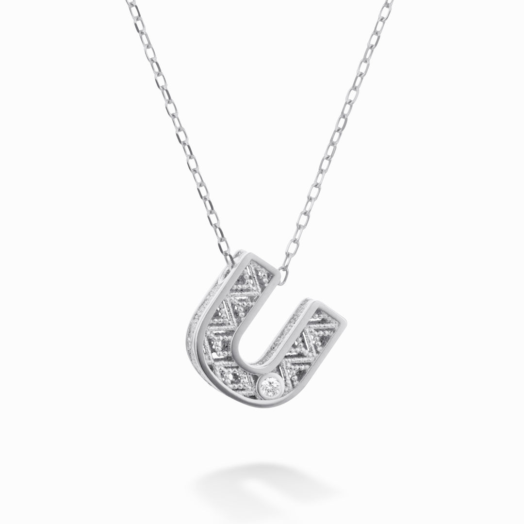Mikiko cl 18k letter u white gold diam. ct.0,01 MDLETUO4