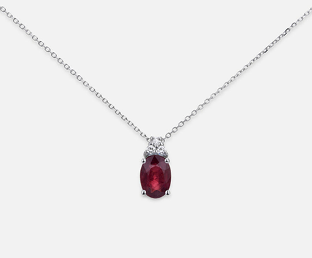 Nihama cl 18k oval ruby 7x5 ct.0.90 dia ct.0.045 ND5055O4RBC
