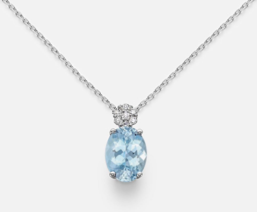 Nihama cl 18k oval aquamarine 7x5 ct.0.50 diam. 0.05 ct ND5025O4AM