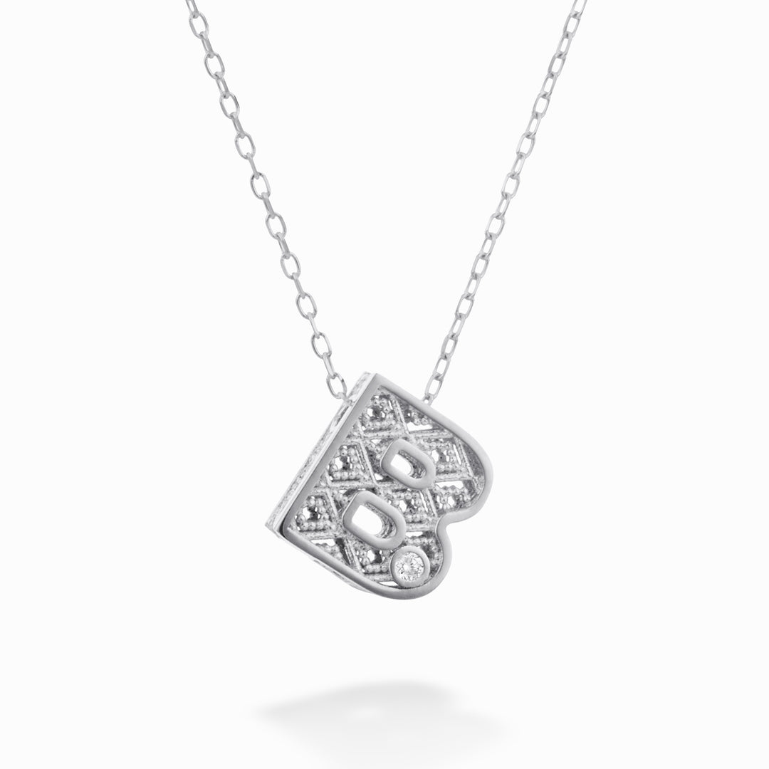 Nihama cl 18k letter b white gold diam. ct.0,01 NDLETBO4
