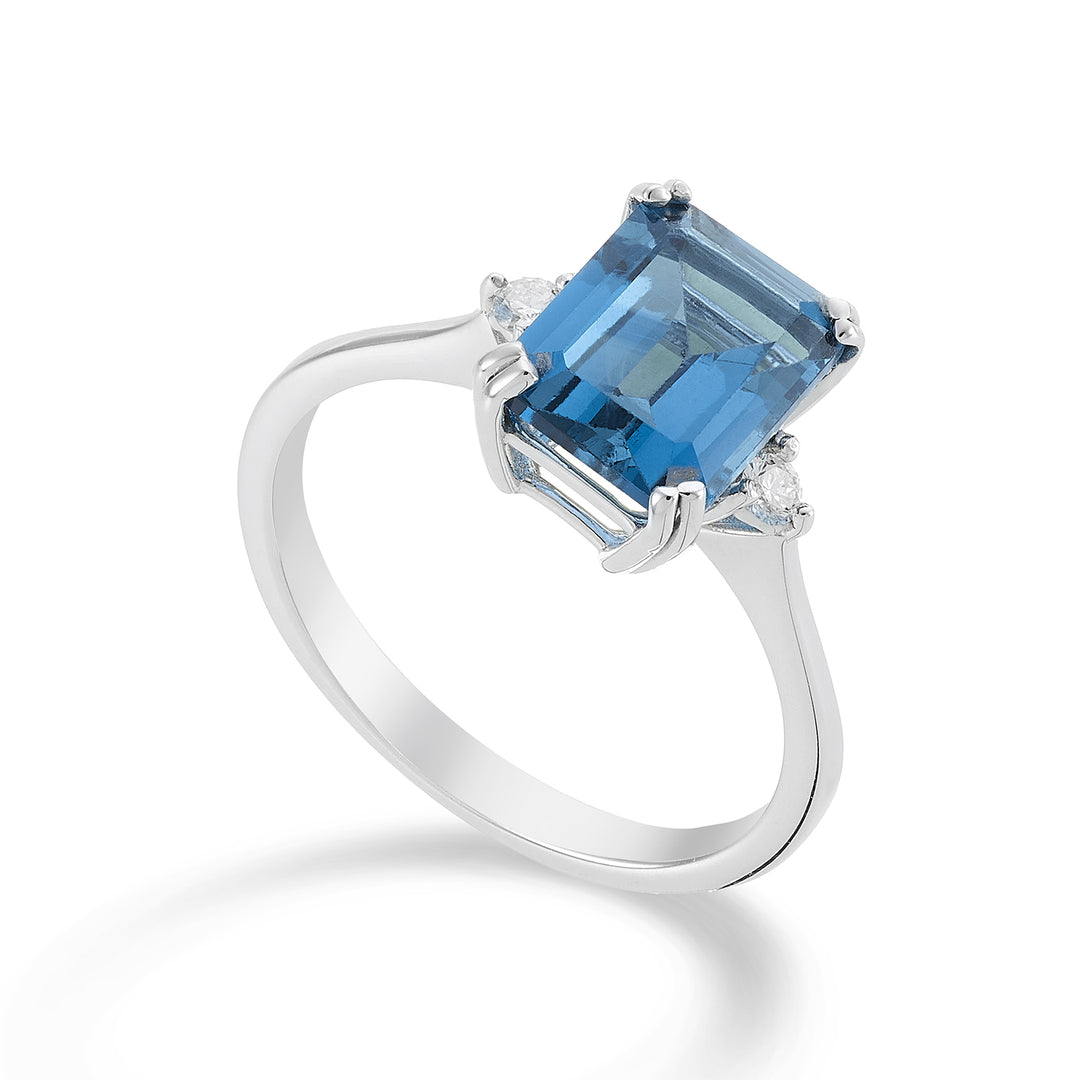 Mikiko an 18k octagonal London blue topaz 7x9 ct.2.65 diam. ct.0,08 MACL090DITPBL4O4