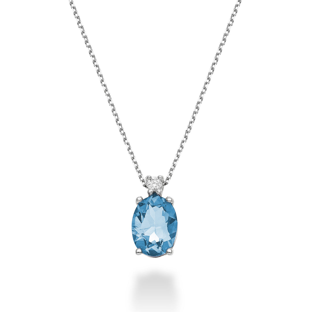 Nihama cl 18k oval blue topaz 8x6 ct.1,50 diam. ct.0,025 ND5036O4TPAZ