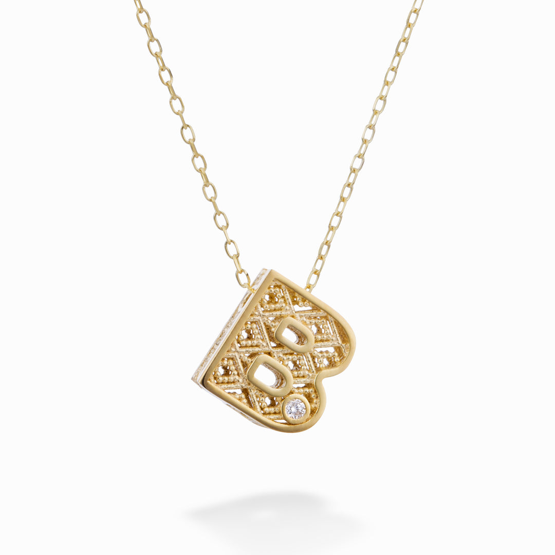 Nihama cl 18k letter b yellow gold diam. ct.0,01 NDLETBO1