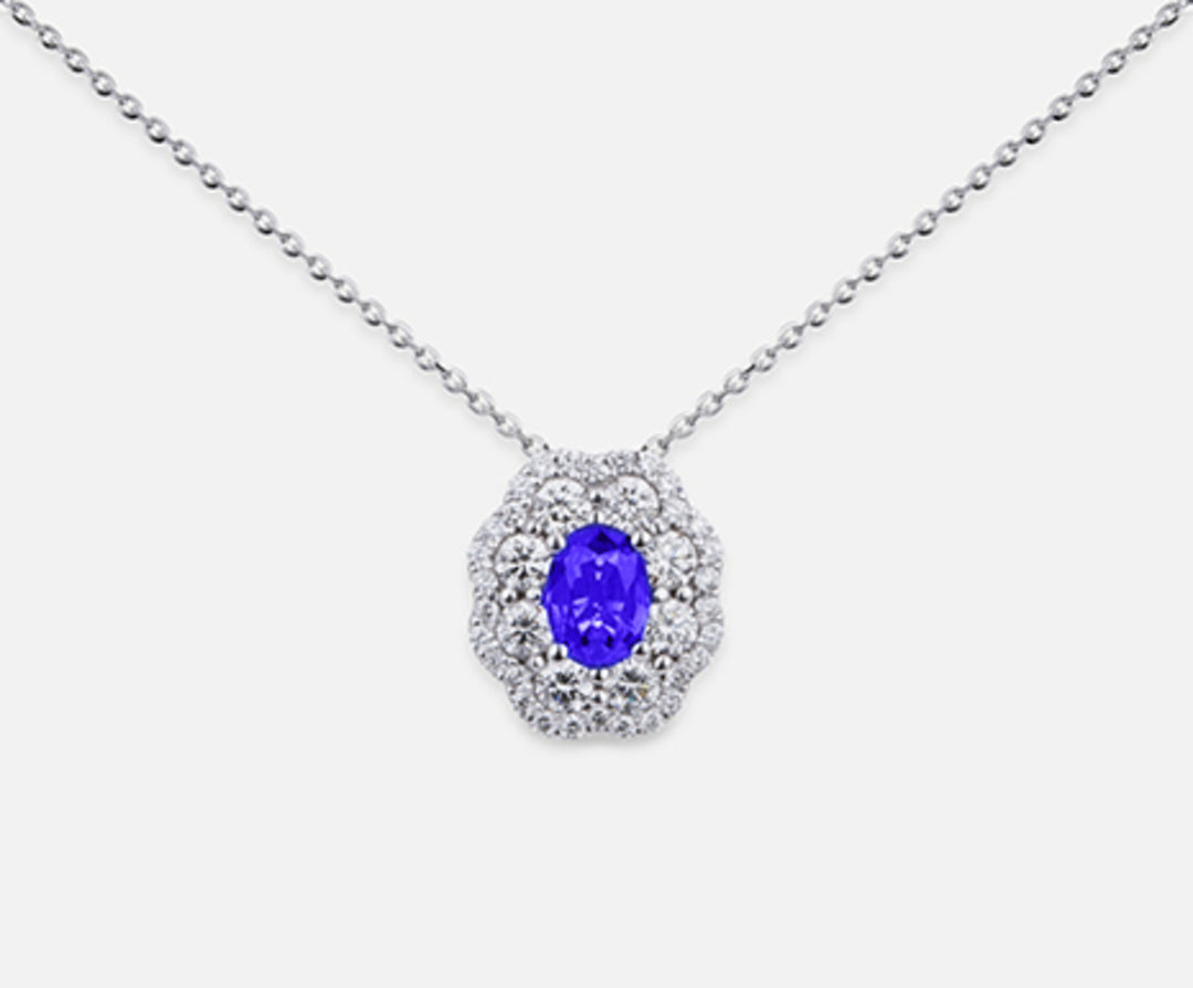 Nihama cl 18k tanzanite n. oval 6x4 ct.0.38 dia ct.0.63 ND5057O4TZN