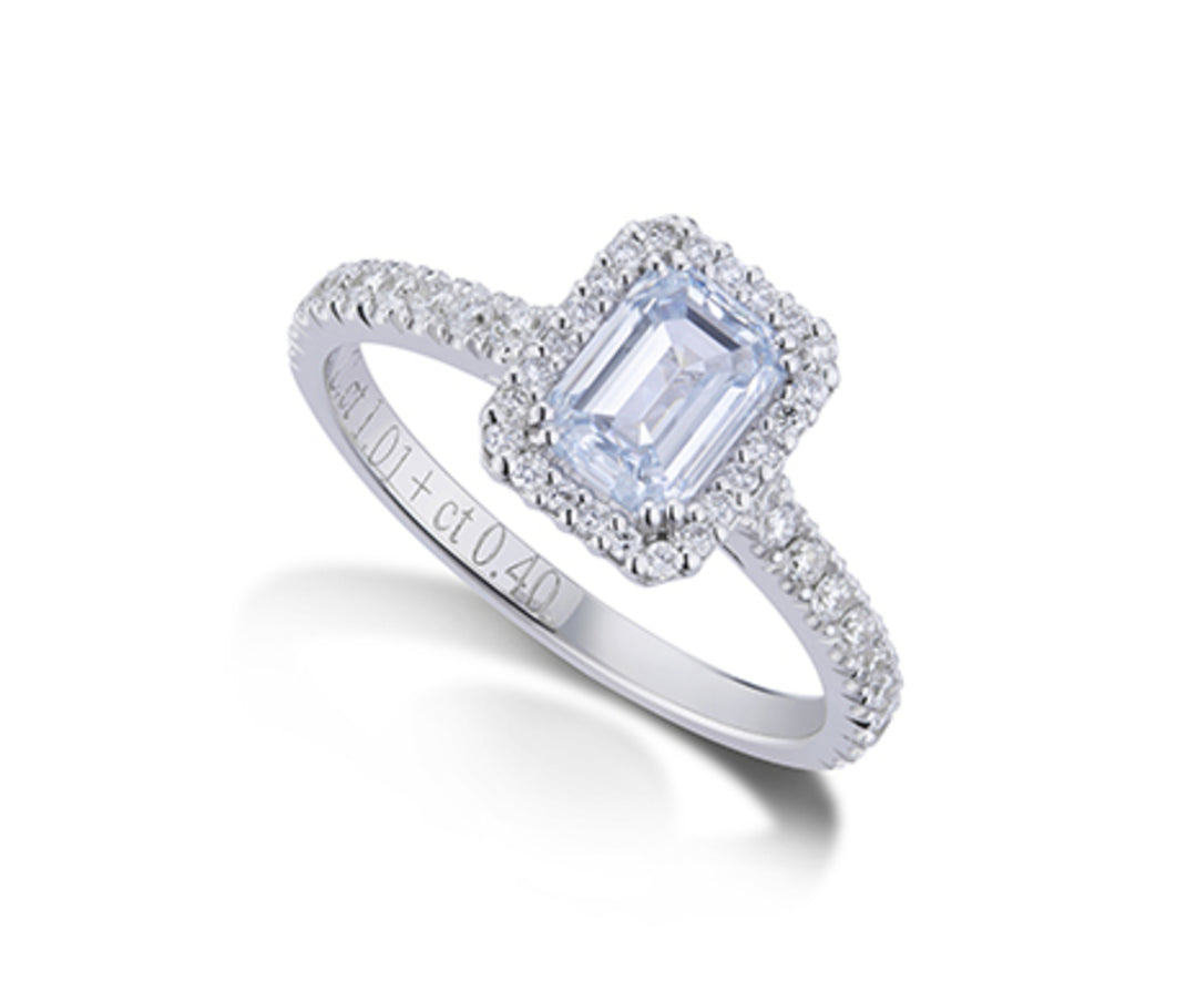 X-Diamond an 18kt lab g.d. f.blue ct.1.01 emerald + ct.0.40 LXDPUAN026O4BB141