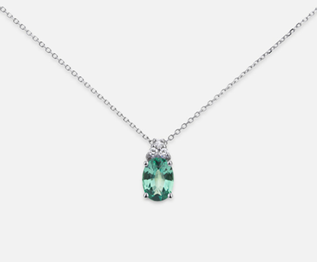 Nihama cl 18k emerald n. oval 7x5 ct.0.60 dia ct.0.045 ND5055O4SMN060