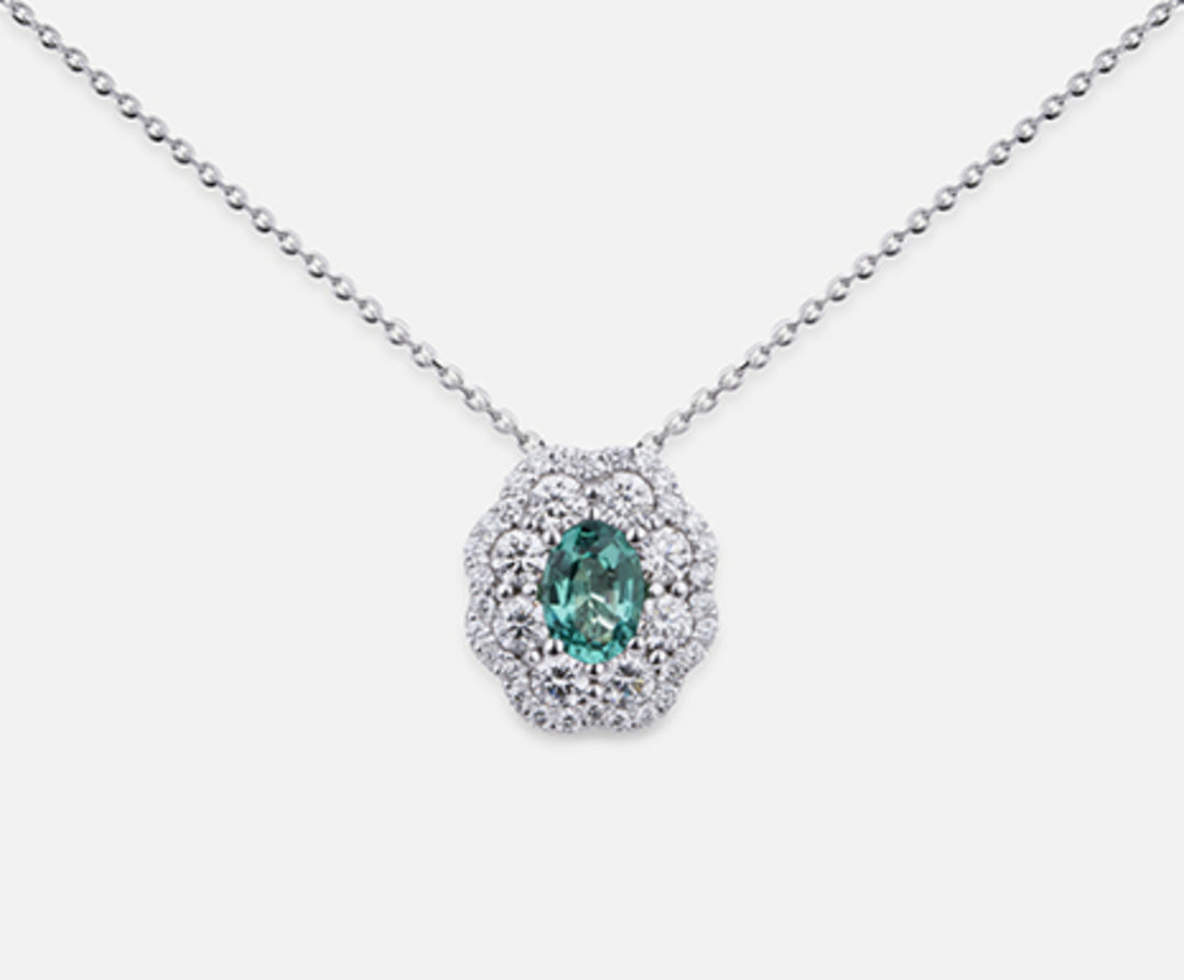 Nihama cl 18k emerald n. oval 6x4 ct.0.38 dia ct.0.63 ND5057O4SMN038